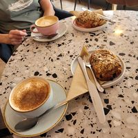 Latte and hazelnut pan au chocolate at Yonder   in Keswick