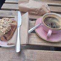 Hazelnut pain au chocolat 😋 and an Americano. at Yonder   in Keswick