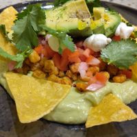 The hummus was good and they give us extra freshly fried corn tortilla chips at no extra cost. at Monk's Butcher - Dosan in Seoul