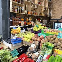 Seasonal produce and homemade preserved vegetables on offer  at Markata e Shijes in Korca