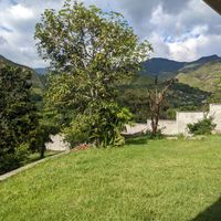 This is a photo of the private garden on the property and the lovely view. at Prasādam in Vilcabamba