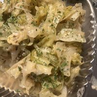 Side of green cabbagee  at More Vegan Cafe in Columbia