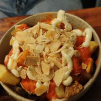 Patatas Bravas, potaoes, red sauce, garlic, fried garlic at Les Tontons Veg - Paradis in Paris