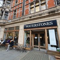 Entrance and outdoor seating at Dillons Coffee in London