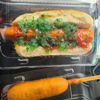 Vegan corn dog, vegan hot dog with ketchup and relish at The Distinguished Wien in Mooresville