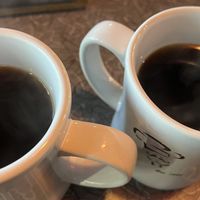 Black coffee in ceramic mugs at Biscuits Cafe  in Beaverton