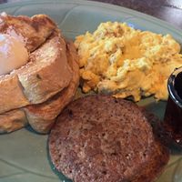  French toast w/ vegan butter, vegan eggs, vegan sausage and maple syrup at Biscuits Cafe  in Beaverton