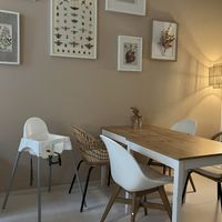 Back room with high chair  at Vlora & Vauna in Dresden