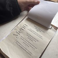 Menu at every table (you order at the cashier desk tho)  at Vlora & Vauna in Dresden