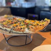Garden pizza on stand  at Urban Field in Longmont
