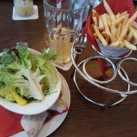 Vegan side salad and french fries at Cafe Extrablatt in Leverkusen
