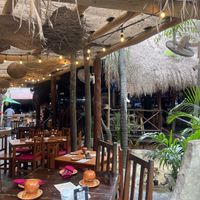 Adorable garden seating  at La Perla in Playa Del Carmen