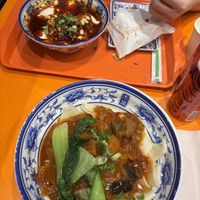 Dry noodles with eggplant and tomato, silken tofu in sauce in the back  at Biang Biang - 古城秦味  in Haymarket