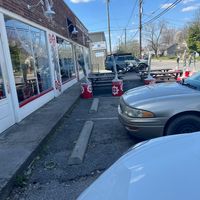 front with parking/ outdoor seating at Pasta Garage in Lexington