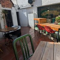 Cozy backyard area at Café Cultor in Bogota