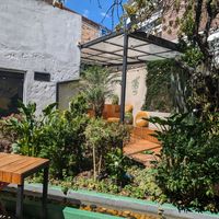 Cozy backyard area at Café Cultor in Bogota