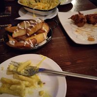 Pakoras, potato wedges and Mac and cheese at John Kavanagh The Gravediggers in Dublin