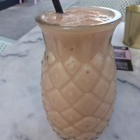 Smoothie de papaya, piña y mango con leche de avena. at Barista38 in Almeria