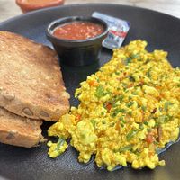 Scrambled tofu, and almond butter and toast on the side  #Veganuary at Projeto Acai - Dubai Marina in Dubai