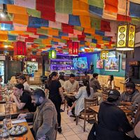Seating area at Momo Ghar in Toronto