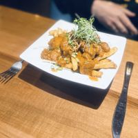 “Butter chicken” poutine  at Benaras in Edmonton