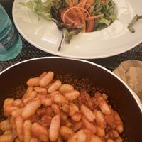 Pasta with soy bolognese and seasonal salad  at MACUS in Fabula in Cagliari