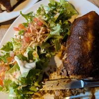The burrito was okay but ask for no dressing on the salad because it contains yogurt. at Two Amigos in Lyon