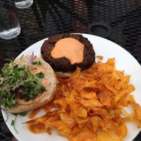 Black bean, mushroom and walnut burger. Delicious with red pepper/cashew sauce. at Lola's Kitchen in Toronto