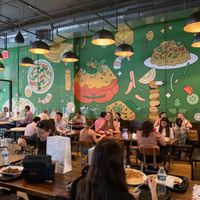 Places to sit in food hall at Jakarta Munch in New York City