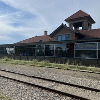 View of side/back patio area along the train tracks. Really cool atmosphere!   at The Filling Station Microbrewery in Traverse City