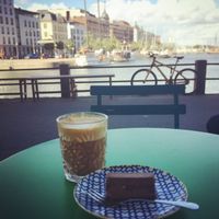 raw triple chocolate slice and an oat milk latte!  at Johan and Nystrom in Helsinki