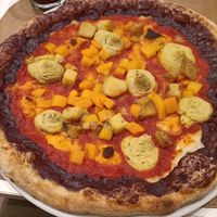 Pizza Lilli (
Polpa di Pomodoro, Cornicione Ricoperto di Crema al Radicchio, 
Zucca a Cubetti, Patate, Hummus di Castagne) at OV.ER Pizzeria in Rovereto