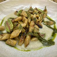 Plantain gnocchi with artichoke velouté sauce and watercress pesto  at Restaurante Cabruca in Sao Paulo