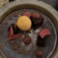Vegan brownie met stoofperensaus en mango ijs  at De Basiliek in Groningen