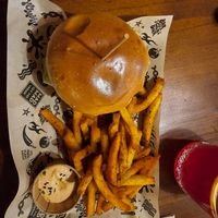 Signature Mad burger + cajun chips. Yum 🤤 at Mad Mad Vegan - Barcelona in Barcelona
