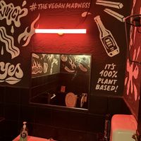Toilet wall  at Mad Mad Vegan - Barcelona in Barcelona