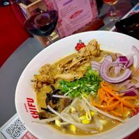 Miso Pinattsu vegan ramen: noodles with Heura (vegan "meat"), pak choi, bean sprouts, shiitake mushrooms, carrot, red onion, chives, homemade broth with miso and pinattsu sauce at Ramen Shifu in Oviedo