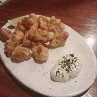 Cauliflower Karaage with delicious dip 😋 at UMAMI Plantbased in Barcelona