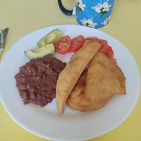 Vegan Plate with fritters, beans, tomatoes and avocado at Josie's  in Utila