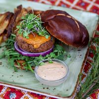 Classic Burger featuring a house-made patty created with Beyond Meat, topped with a chipotle cashew gouda at Great Sage in Clarksville