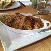 Weekend mac n cheese special with four types of house made cheese, cranberries, and spinach. at Great Sage in Clarksville