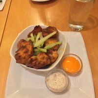 Buffalo Cauliflower Bites - Deep-fried Battered Cauliflower with Vegan Buffalo Sauce and Vegan Ranch  at Great Sage in Clarksville