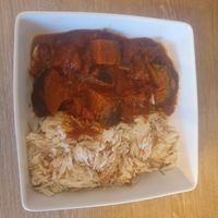 Vegetable Stew & Kabseh Rice: Fresh aubergines, courgettes, mushroom, red and green peppers, onions, cooked in tomato sauce, with garlic and herbs. Served with Kabseh Rice at Yara in Alderley Edge