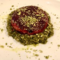 Beetroot flower on a bed of leeks  at Il Lughino in Milan