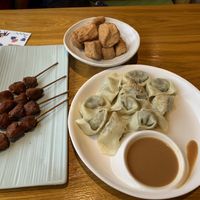 Jiaozi with sesame sauce, spongy tofu, lion’s mane skewers (we had eaten some at this point)  at Huì Yuán Sù Shí Fāng 慧缘素食坊 Lotus Vegan in Shanghai
