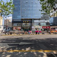 Outside restaurant on the street. Restaurant on the second floor. at Huì Yuán Sù Shí Fāng 慧缘素食坊 Lotus Vegan in Shanghai