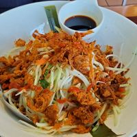 Papaya salad. A perfect mix with all the flavors this dish should have - plus vegan "pork floss" garnishing it. at Veggiebowl in Vancouver