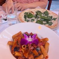 Vegan pasta with vegetables and vegan pizza witch spinach   at Sofia's in New York City