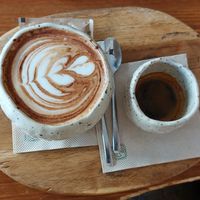 Almond cappuccino and cafe solo at Bloome By Sasha in Barcelona