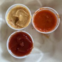 Garlic, Spicy Chili and ketchup   at Uumami Food Cart in Eugene